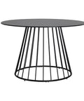 Mesa de comedor Celije con tablero de metacrilato negro veteado y estructura de hierro, diseño moderno y elegante para hasta 6 comensales.