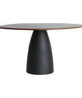 Mesa de comedor en madera de mango con base de hierro, diseño industrial robusto y elegante.