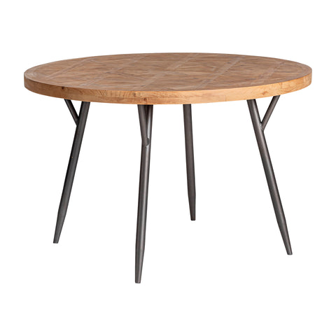 Mesa de comedor redonda en madera de abeto con patas metálicas, ideal para espacios acogedores.