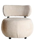 Sillón Valence tapizado en poliéster con estructura de madera de pino, diseño elegante y confortable para cualquier ambiente.