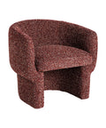 Sillón vintage redondo en tonos marrones, tapizado en poliéster con diseño envolvente.