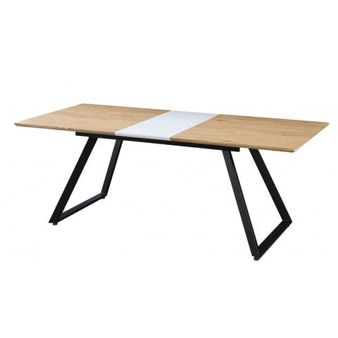 Mesa de comedor extensible con estructura metálica y tapa en DM bilaminado, ideal para espacios modernos.